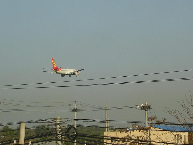 DSC01860.JPG - A Hainan jet landing in Beijing (from our hotel room). 21 October 2009