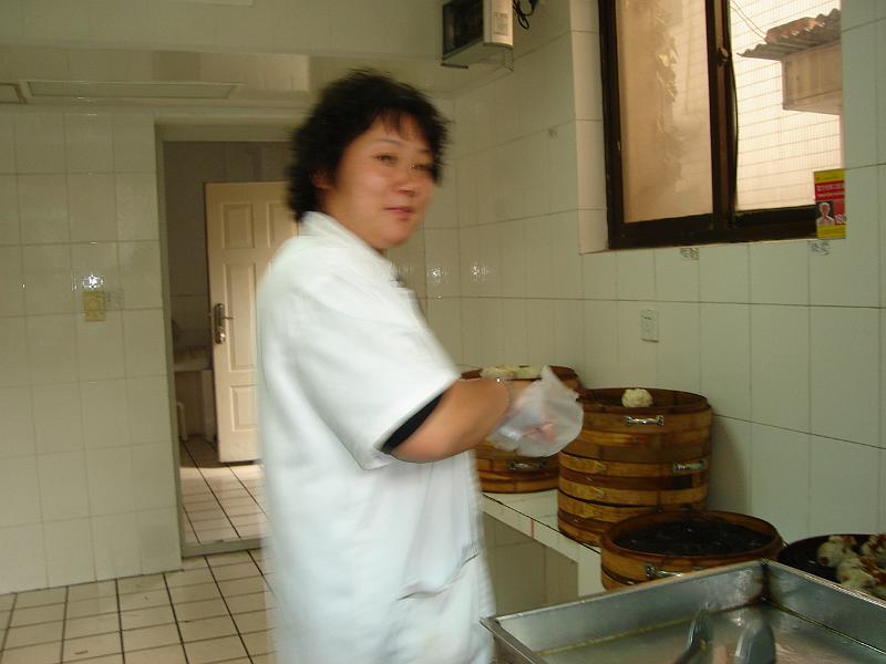 DSC01885.JPG - The lady who makes and sells boazi (steamed buns filled with stuff). 22 October 2009