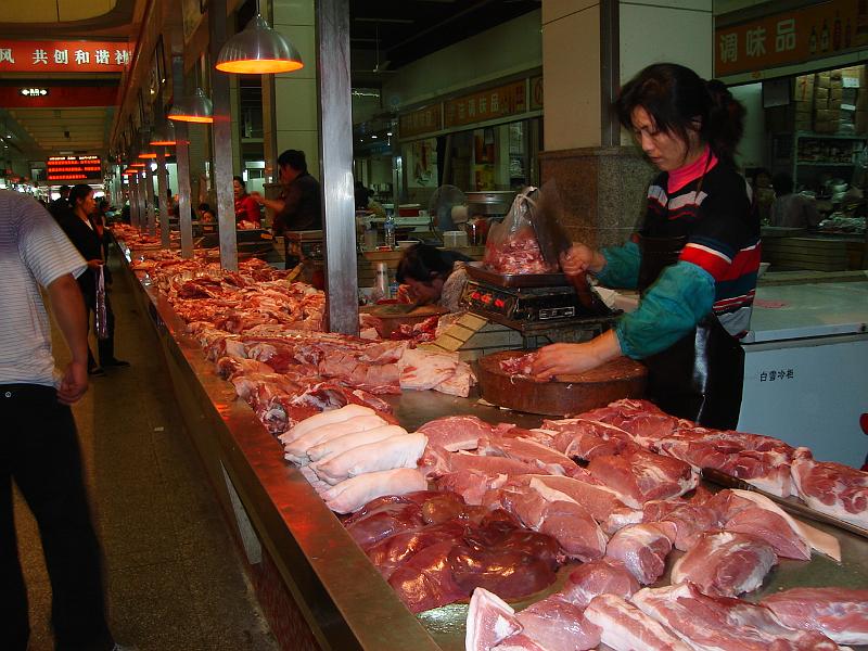 DSC01891.JPG - Meat being sold at the market. 22 October 2009