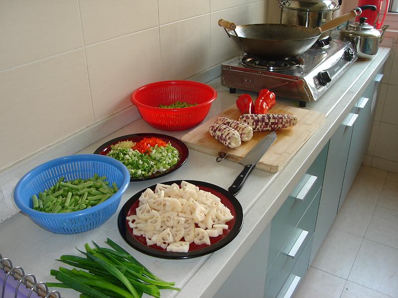 DSC01926.JPG - The meal Brenda is preparing from the meat and vegetables we bought that morning at the market. 22 October 2009