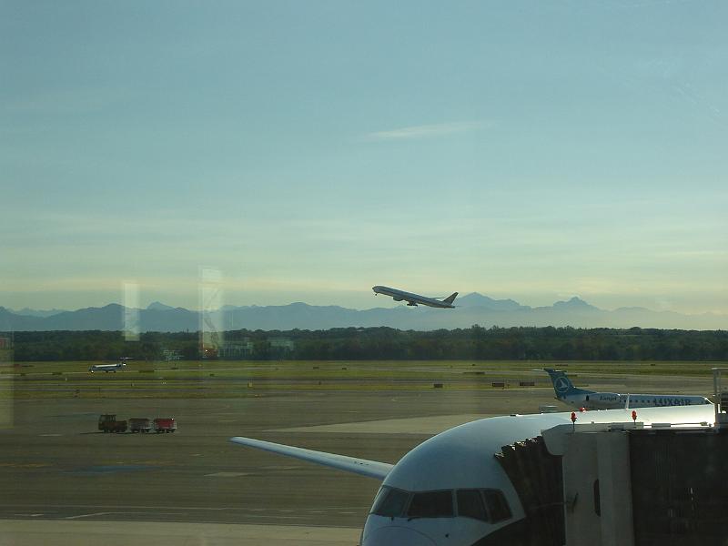 DSC01000.JPG - Plane taking off from Milan's Malpensa airport, heading over the Italian Alps. 12 July 2007