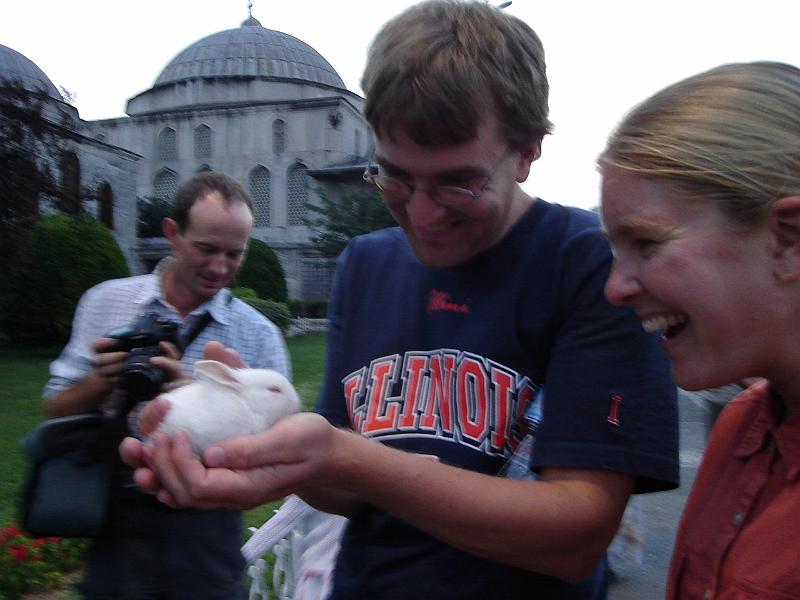 DSC01017.JPG - Matt, Andrew, and Gretchen with a bunny, with the Haghia Sophia (Aya Sofya) in the background. 12 July 2007