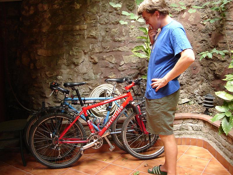 DSC01021.JPG - Andrew inspecting the bikes that have carried Gretchen and Matt through Africa, Europe and now into Turkey, and soon onto India and Japan. 13 July 2007