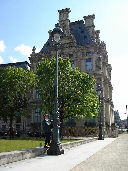 DSC02314.JPG - Judy under a very tall lampost on the grounds of the Louvre, Paris. 16 April 2008