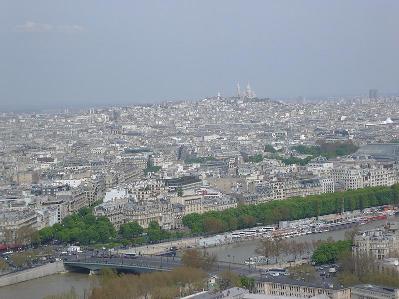 DSC02325.JPG - From the Eiffel Tower: the Seine and the Sacré-Coeur basilica on the horizon.  Paris 17 April 2008
