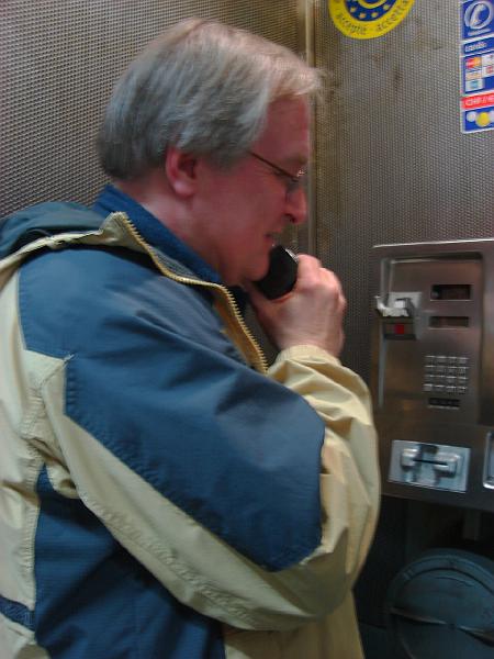 DSC02448.JPG - Bill on the phone with Mick, confirming our train is on time.  Geneva Switzerland 21 April 2008