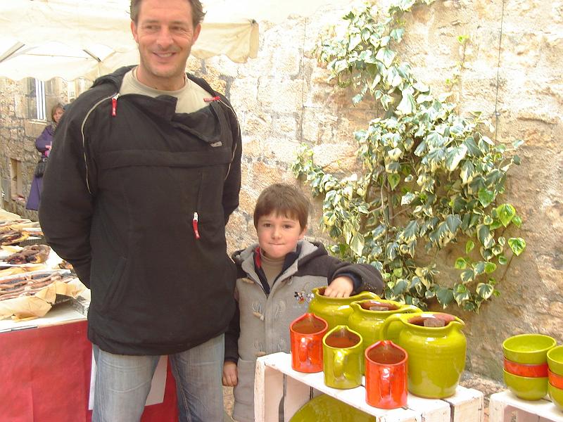 DSC02480.JPG - A French potter and his assistant.  Sarlat France 23 April 2008