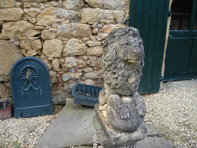 DSC02579.JPG - A lion in the couryard of Les Papillons, where we ate a delicious eight course dinner prepared and served by Andrew and Tom,  in the Dordogne region.  France 24 April 2008