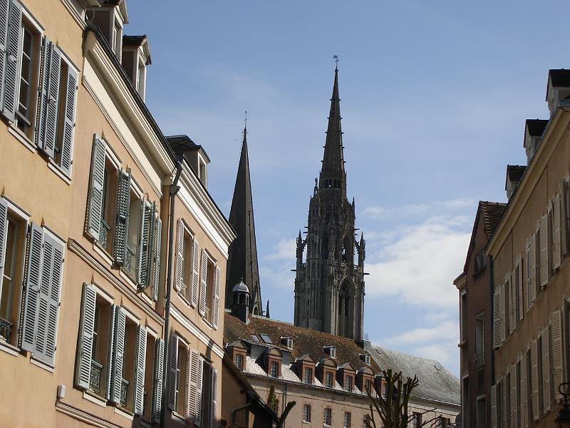 DSC02591.JPG - Chartres Cathedral rising above the buildings.  Chartres France 25 April 2008