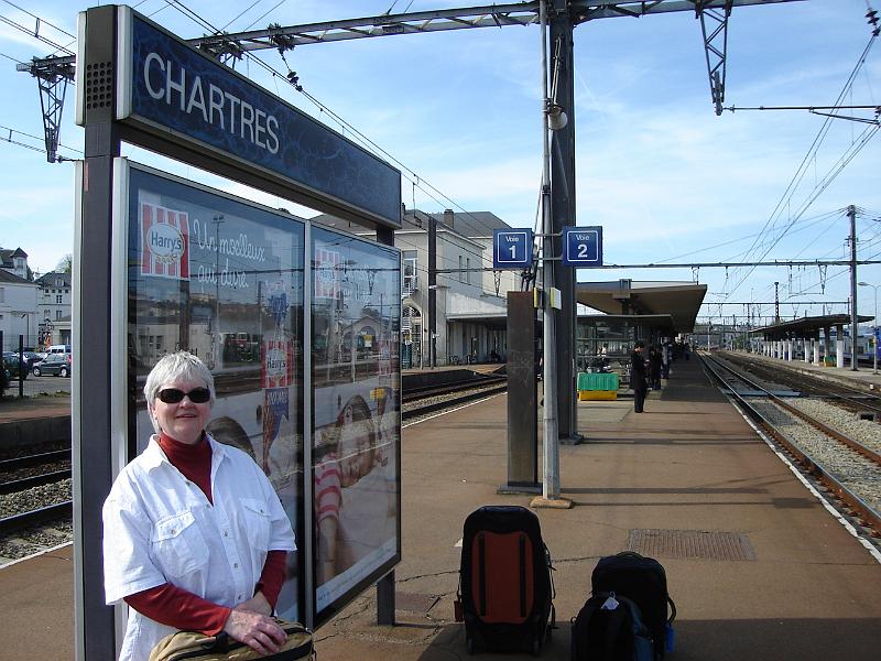 DSC02611.JPG - Judy waiting for the train to return to Paris.  We sat in the same seats of the same car we arrived in a day earlier, we could tell because of some paper wedged into a hinge of the seat in front of us!  Chartres France 26 April 2008