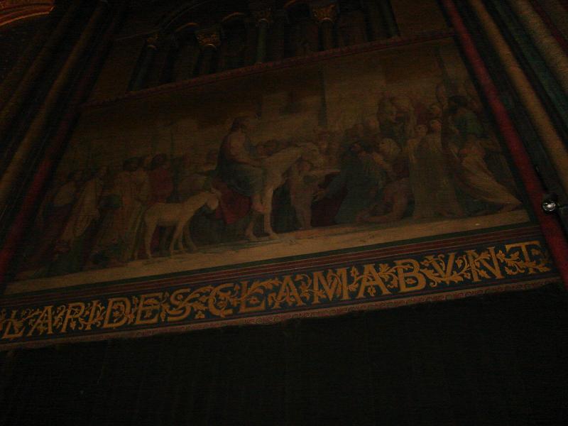 DSC02703.JPG - A painting depicting Palm Sunday with the words "even the stones will cry out", in the choir area of the St. Germain des Pres Church.  Paris France 28 April 2008
