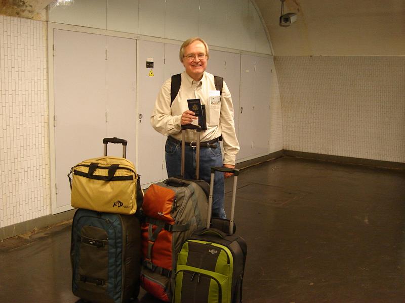 DSC02720.JPG - Bill in the RER station on the way to Charles de Gaulle airport.  He seems happy about his passport.  Paris France 29 April 2008