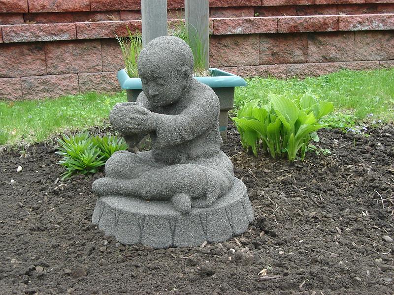 DSC01083.JPG - The latest addition to the Temple Court gardens - a small mendicant. 13 May 2009