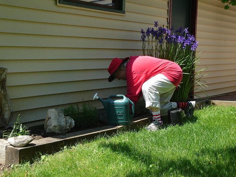 DSC01097.JPG - Judy getting a planter ready for some new spring plants. 24 May 2009