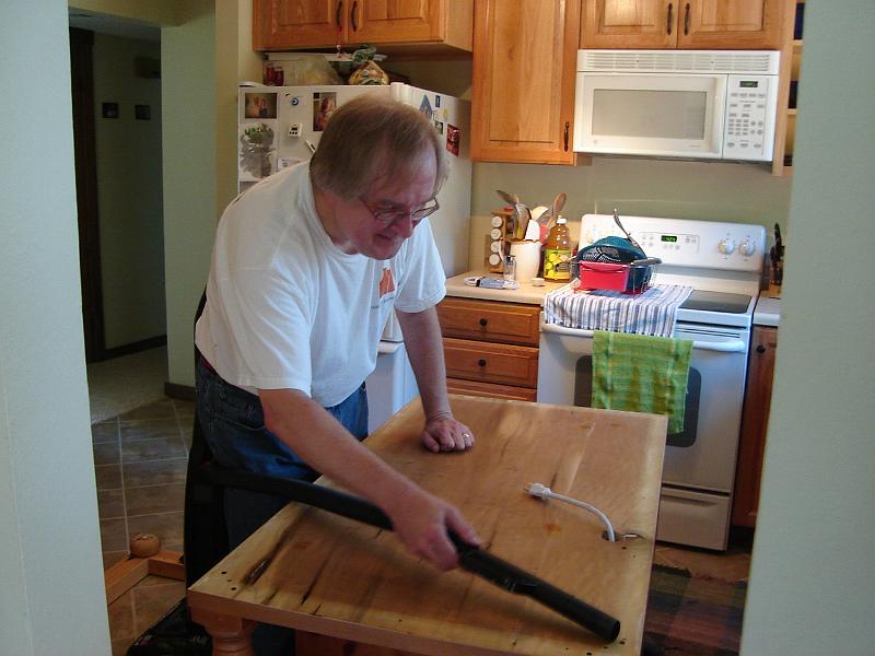 DSC01320.JPG - Bill finishing Matt's kitchen island. 21 July 2009