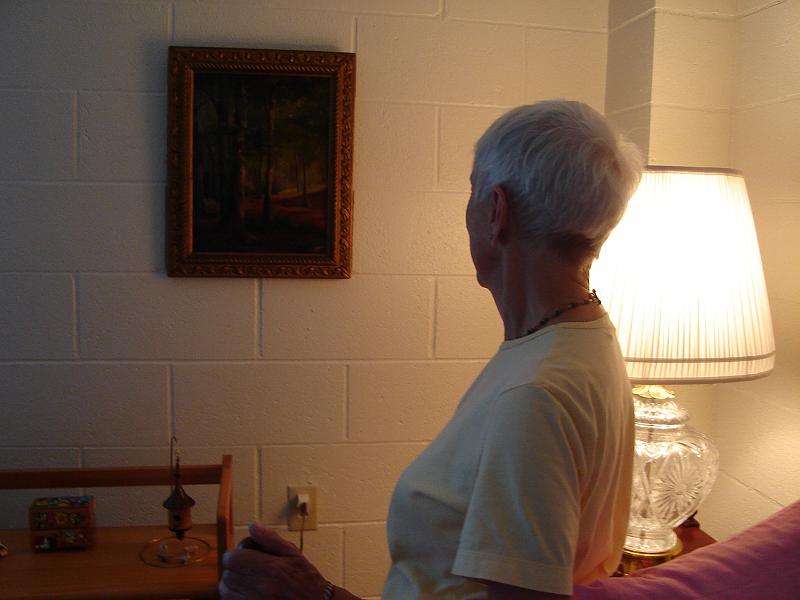 DSC01377.JPG - Ramona looking at her newly-hung tree painting. 8 August 2009