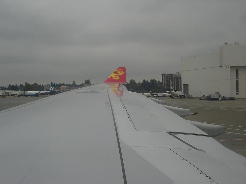 DSC01848.JPG - Our plane's wing from Judy's window seat. 19 October 2009