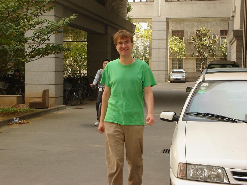 DSC02124.JPG - Andrew coming from his office to meet us for lunch, after we spent the morning going to the market with Brenda, doing a load of laundry, and hanging it up to dry. 26 October 2009