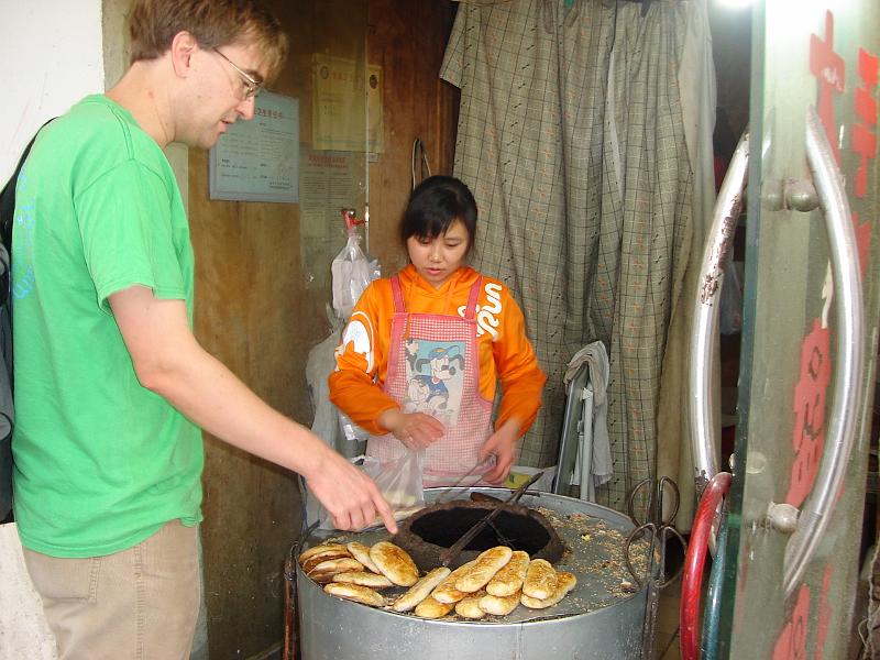 DSC02126.JPG - Andrew getting bread for lunch. 26 October 2009