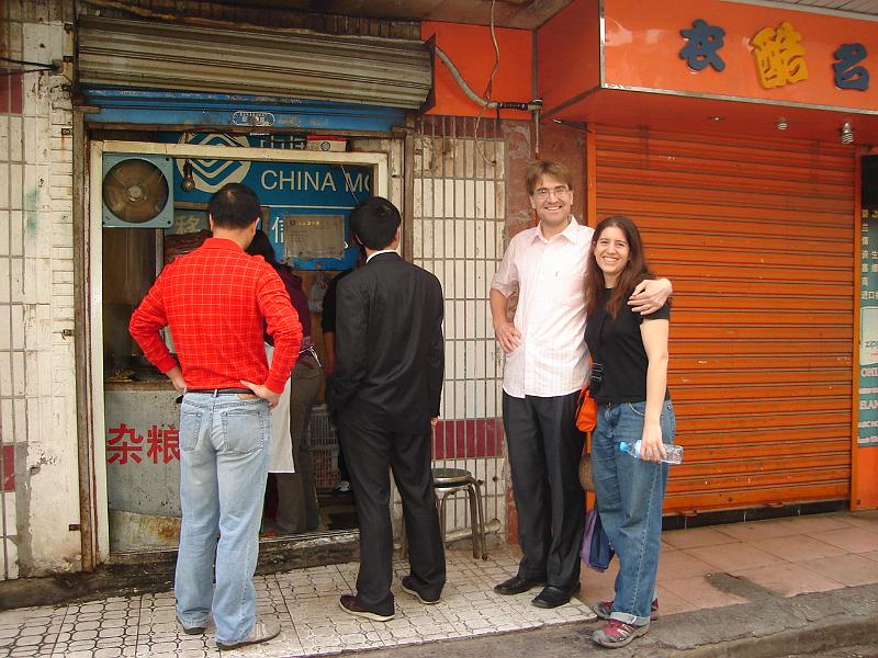 DSC02200.JPG - Andrew and Brenda at their favorite crepe stand, getting us breakfast.  We then went to the Shitang for juice and soup to complete the breakfast. 28 October 2009