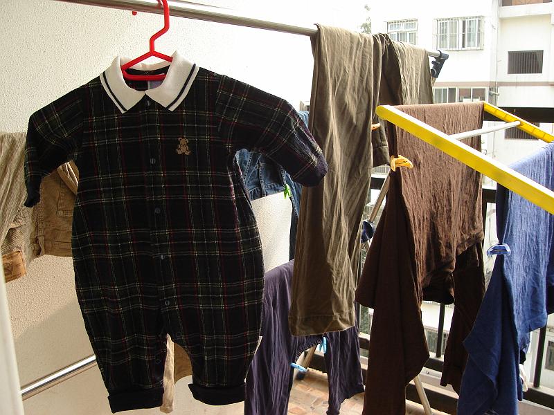 DSC02272.JPG - Clothes, even Sebastian's new outfit from China, hanging out to dry on Andrew and Brenda's balcony. 29 October 2009