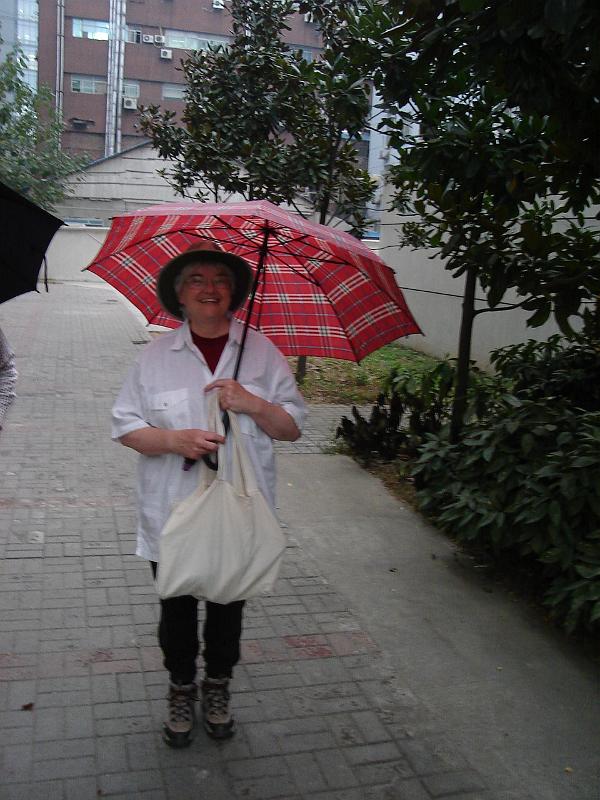 DSC02278.JPG - Judy ready to go to the Suguo (a grocery store).  It is raining for the first and only time during our trip to Nanjing. 29 October 2009