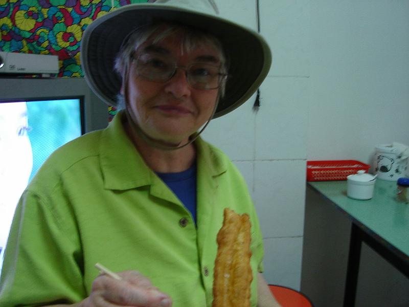 DSC02292.JPG - Judy eating Chinese bread. 30 October 2009