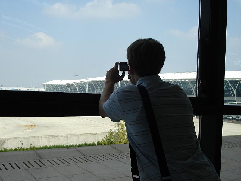 DSC02402.JPG - Andrew plane spotting in the Shanghai airport. 31 October 2009