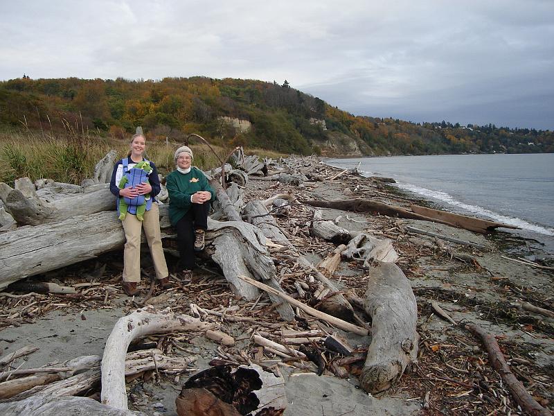 DSC02565.JPG - Gretchen, Sebastian, and Judy amidst the driftwood on the beach at Puget Sound. 2 November 2009