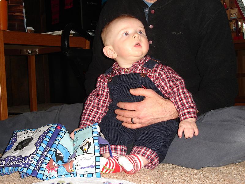 DSC02802.JPG - Sebastian not too sure with his first Christmas gift in Wisconsin. 31 December 2009