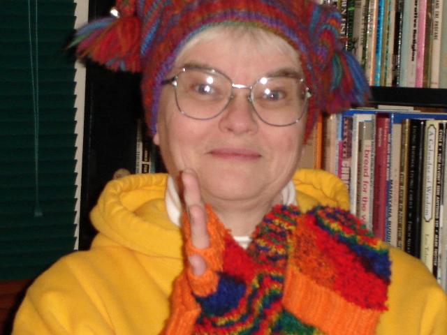 j-fing.jpg - Judy showing off the gloves Gretchen knitted, note the option of having fingers free! 21 January 2006