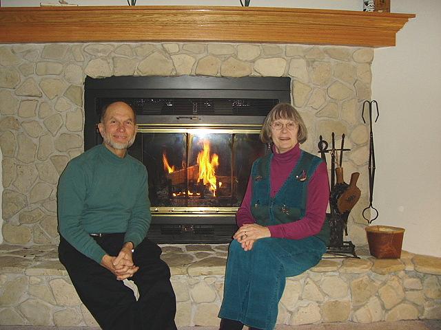 8bb-fire.jpg - Bob and Bonnie by the fireplace in their home in Door County. 28 January 2006.