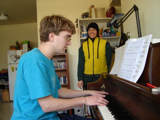 DSC00150.JPG - Brenda ensuring Andrew and Farley keep working on that Rachmaninoff. 25 February 2006