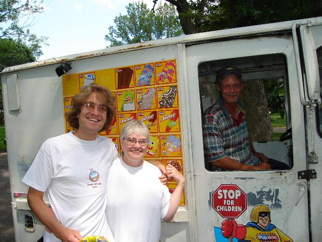 354.jpg - The ice cream truck came by.  Andrew and Judy got a treat! 27 July 2006