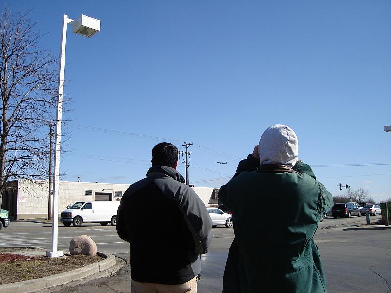 DSC00826.JPG - Eshan and Andrew plane spotting at gas station at O'Hare. 20 March 2007