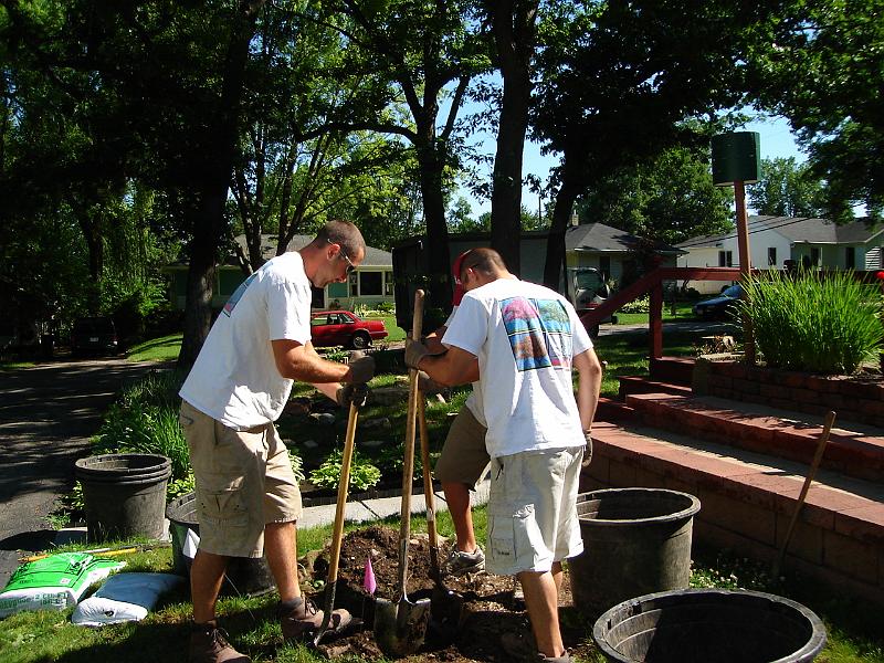 DSC00953.JPG - The crew from the Bruce Company begins the dig through Lawrence's roots to plant Maximilian. 19 June 2007