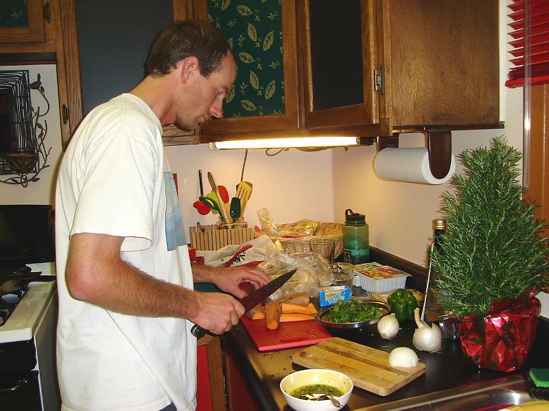 DSC02093.JPG - Matt slicing and cooking a Thanksgiving Day feast. 22 November 2007