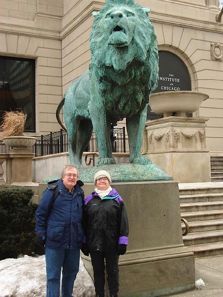 DSC02222.JPG - Bill and Judy under a lion guarding the Art Institute of Chicago. 21 February 2008