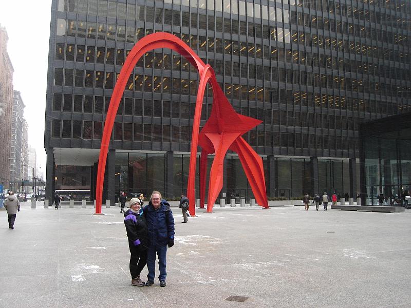 DSC02233.JPG - Judy and Bill at "The Flamingo" by Alexander Calder in the Federal Center Plaza. Dearborn and Adams, Chicago. 21 February 2008