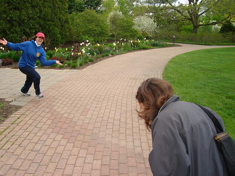 DSC02784.JPG - Brenda getting on the brown brick road while Sara laughs.  Olbrich Gardens.  Madison 18 May 2008