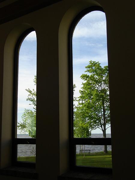 DSC02854.JPG - Trees and the waters of Lake Winnebago outside the windows of the Chapel.  Retreatants are invited to open themselves to the love of God, to grapple with personal and social sinfulness, and to ponder the life, death, and resurrection of Jesus. 27 May 2008