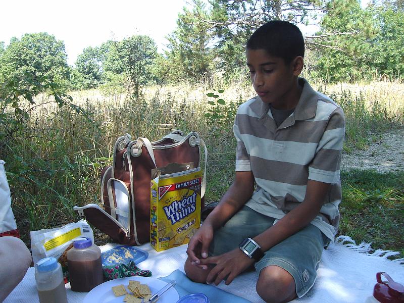 DSC00220.JPG - Kavi at our picnic at the Spring Green Preserve, the Wisconsin Desert. 20 August 2008