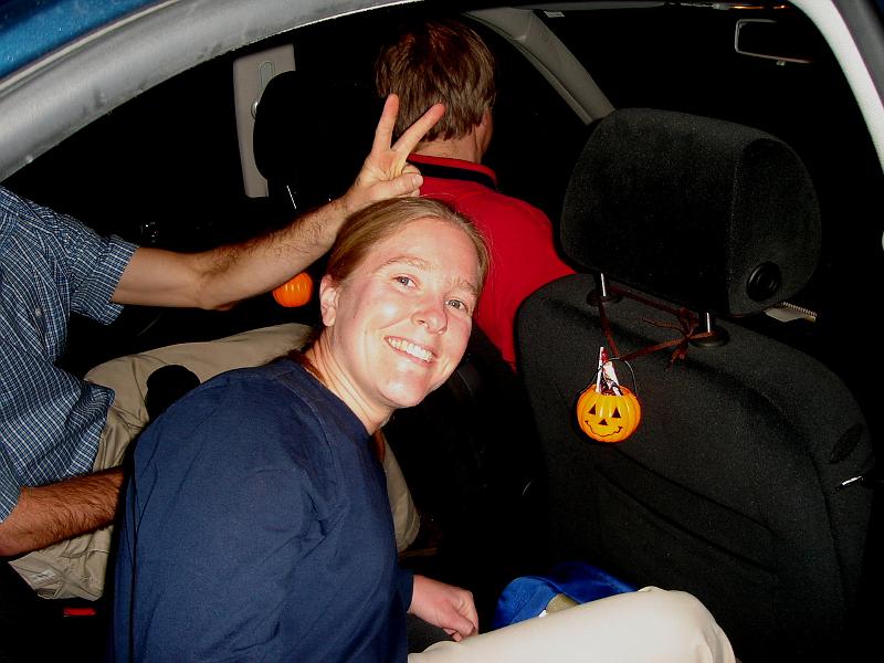 DSC00483.JPG - Pumpkins with Halloween goodies await the travelers in Shackleton.  Matt making bunny ears, Bill in driver's seat and Gretchen smiling and glowing, as always. 3 November 2008