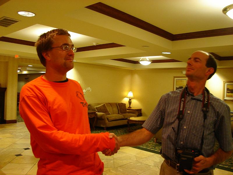 DSC00490.JPG - Andrew and Matt greeting each other with the usual dignity.  Lobby of the Holiday Express Inn, Urbana 3 November 2008