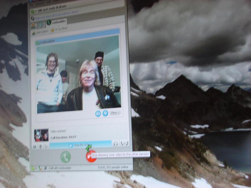 DSC00625.JPG - Sarah, Marci, Richard, and Ron - being Skyped The News in Boulder about the newly expected one! 25 December 2008