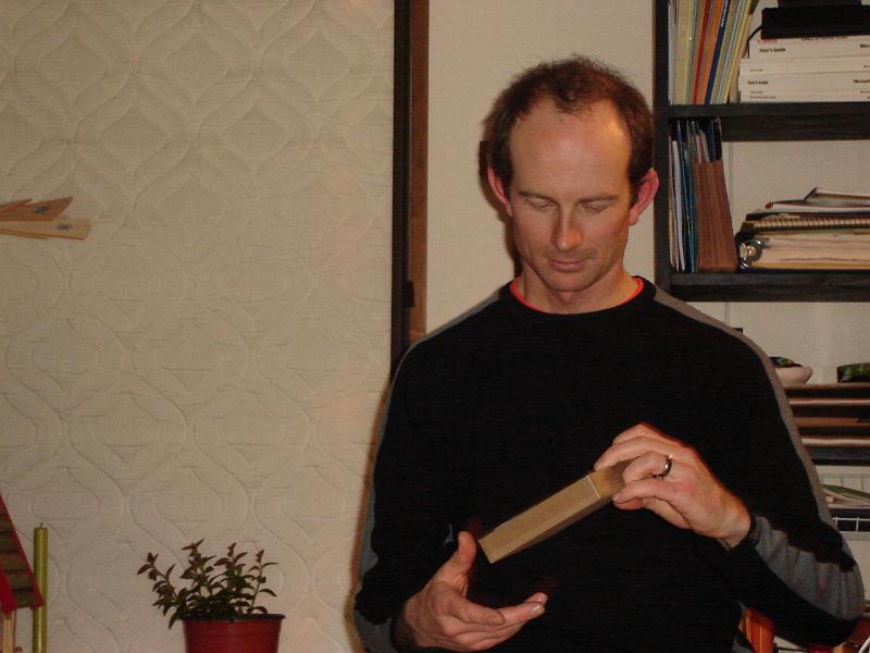DSC00666.JPG - Matt opening one of his gifts. 28 December 2008