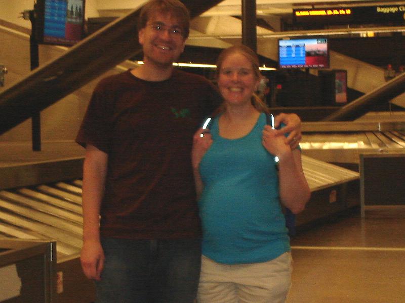 DSC00933.JPG - Andrew and Gretchen (and Little Man) at Sea-Tac meeting Judy, the Grandma to be. 2 May 2009