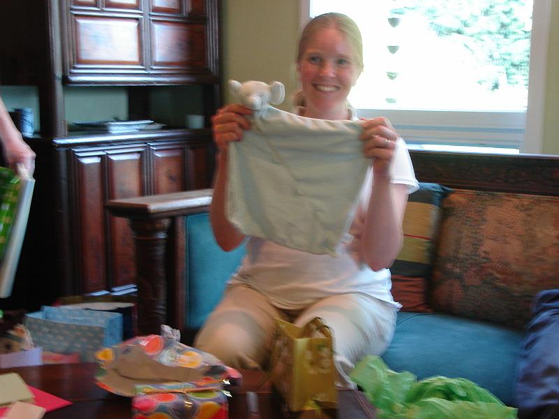 DSC00988.JPG - Gretchen with a gift from Ramona at the shower. 3 May 2009